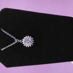 "Sun Flower" shaped pendant with clear crystals